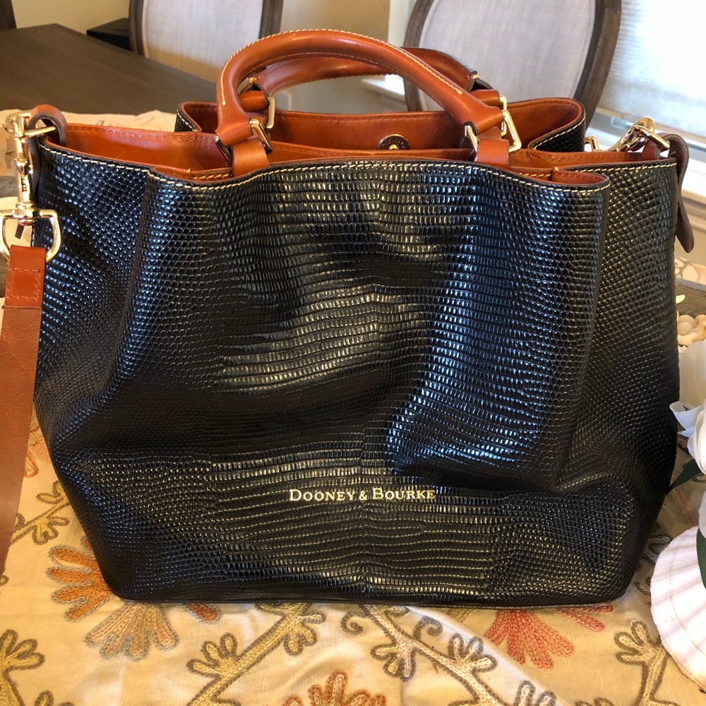 Dooney&Burke Black embossed shoulder bag.